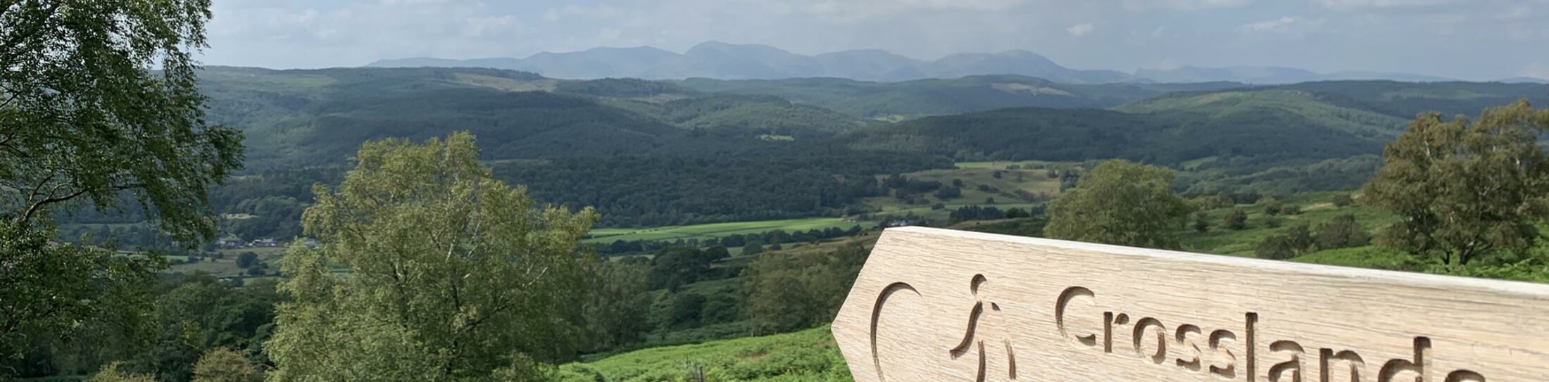 Lake District - Crosslands walking sign | © Original Jessica Howe, ALPS ALPINE EUROPE GmbH Lake District - Crosslands walking sign | © Original Jessica Howe, ALPS ALPINE EUROPE GmbH